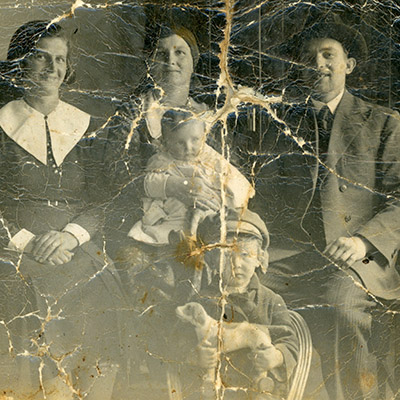  1937 Lipa and Sura as a young couple with their children Yosef Chaim and Shiphra. This photo was hidden, damaged but survived the war 