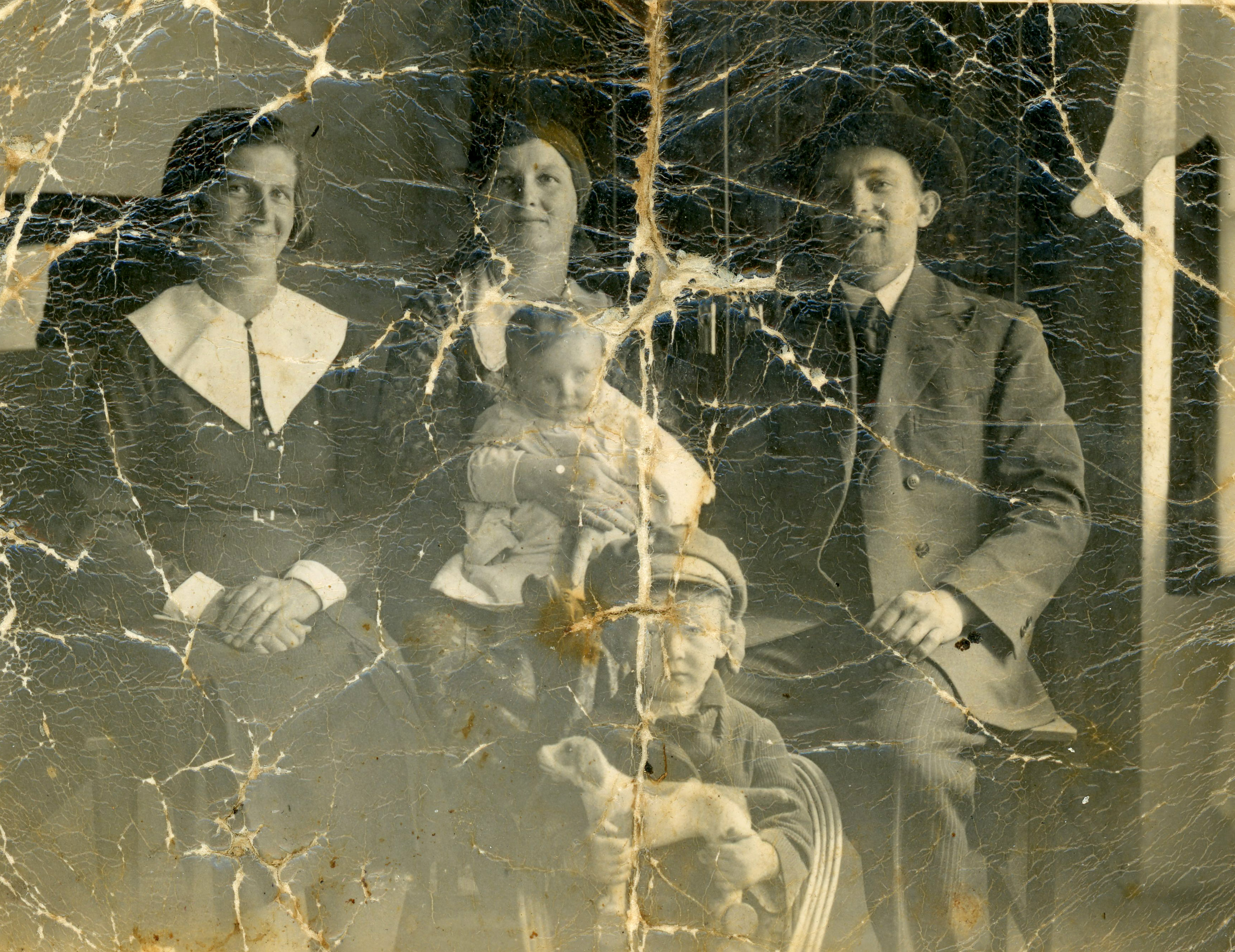  1937 Lipa and Sura as a young couple with their children Yosef Chaim and Shiphra. This photo was hidden, damaged but survived the war 